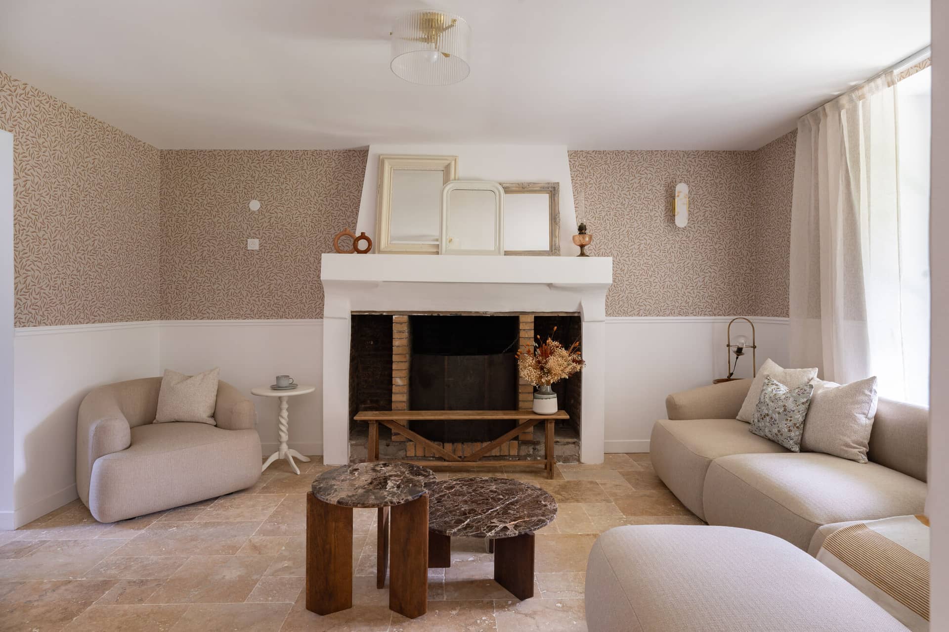 Lounge of the Guest House with sofas, at the estate